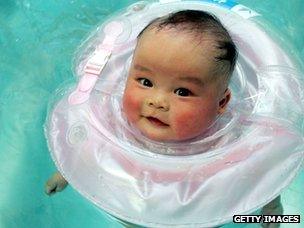 File photograph of a Chinese baby in a swimming pool