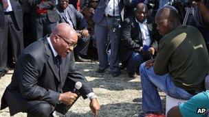 South Africa's President Jacob Zuma with miners at Marikana (22 August 2012)