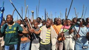 Striking miners walk to the Marikana mine. Photo: September 2012