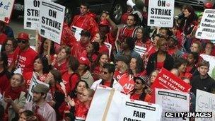 Striking Chicago public school teachers and their supporters march down Michigan Avenue on 13 September 2012 in Chicago, Illinois