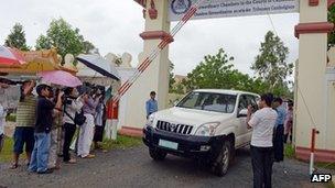 Car leaving the UN-backed court in Cambodia