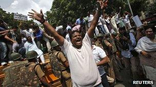 A supporter of India"s main opposition Hindu nationalist Bharatiya Janata Party (BJP) shouts anti-government slogans during a protest against rise in fuel prices and Foreign Direct Investment (FDI) in New Delhi September 15, 2012.