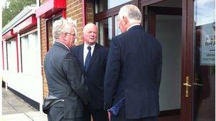 Eamon Gilmore with Robin Cole and John Robinson from Ulster Rugby