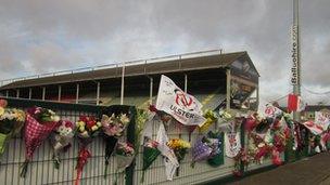 Flowers and tributes have been left at Ravenhill rugby ground