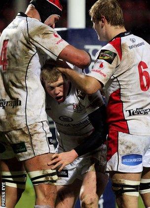 Nevin Spence is congratulated by Johann Muller and Chris Henry after scoring a try against Treviso last year