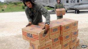 Marines offloading USAID supplies in Haiti, 2008