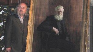 Bill Bailey with portrait of Alfred Russel Wallace