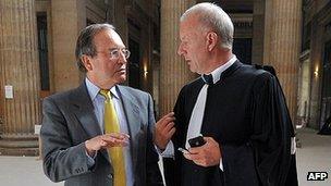 Alleged victim Jean Marchand (left) with lawyer at Bordeaux court, 24 Sep 12