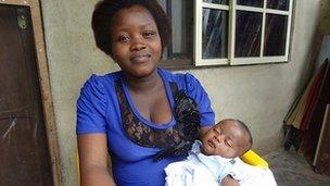 Affiong with her baby