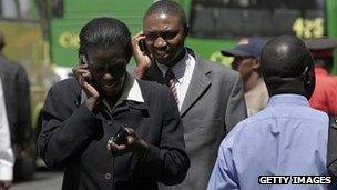 Kenyans using mobile phones in Nairobi