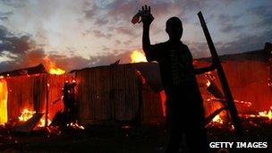 Houses burn in Kericho, Kenya