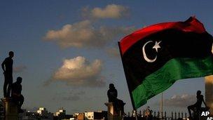 Libyans watch the protest against Ansar al-Sharia Brigades and other Islamic militias in Benghazi on 21 Sept 2012