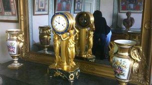 A bronze clock up for auction in the former home of President Giscard d'Estaing