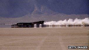 The Thrust SSC Land Speed Racer races down the Nevada desert floor as it sets the land speed record at Black Rock Desert in Nevada