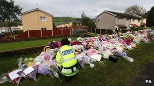 Flowers left at the scene of the shooting