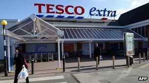 Customers outside a Tesco Extra