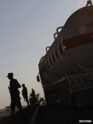 Soldiers stand guard at a gas facility of Pemex in Reynosa