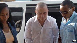 Angel Carromero (C) is brought to trial in Bayamo, Cuba, 5 Oct 2012