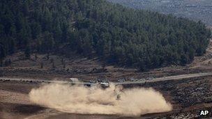 Israeli helicopter lands near site of downed drone. 6 Oct 2012