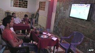 Palestinians in Rafah coffee shop watching La Liga match between Sevilla and Barcelona - 29 September