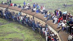 Passengers on an overloaded train in Nairobi