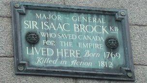 Plaque dedicated to Sir Isaac Brock above Boots in Guernsey