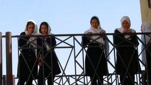 Girls standing in playground