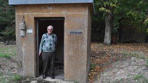 Site owner Keith Eldred in front of s storage kiosk