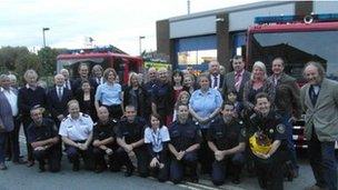 Fundraisers with the team ready for the Romanian project, with Reverend Murray McBride (far right) the brigade chaplain who blessed the engines and volunteers