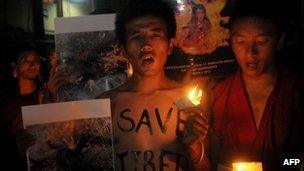 Exiled Tibetans pray mourn Sangay Gyatso, 27, who died after setting himself on fire in Tibet's Amdo region on October 6, 2012