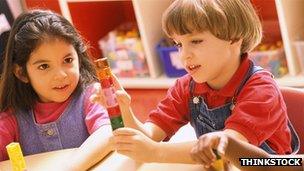 Children playing with bricks