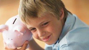 Boy and piggy bank