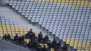 Riot police at an empty Borg El Arab stadium in Egypt (16 Sept 2012)