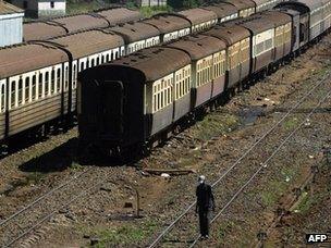 Man walking in Nairobi railway yard