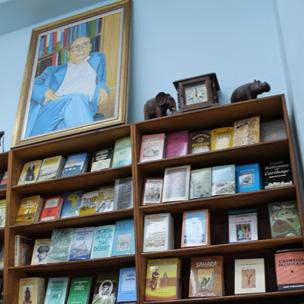 Bookcase and portrait