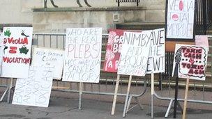 Protesters placards outside county hall