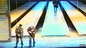 Video taken during the Dubrovka Theatre siege shows gunmen on stage