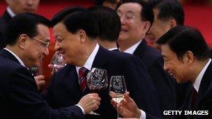 Chinese Vice Premier Li Keqiang (L), head of the Chinese Communist Party"s Central Propaganda Department Liu Yunshan (C) and Chinese Minister of the Organisational Department Li Yuanchao (R) drink at a banquet in Beijing (29 Sept 2012)