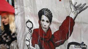 A United Opposition bloc's election campaign placard, displaying an image of Yulia Tymoshenko, is seen in Kiev October 24