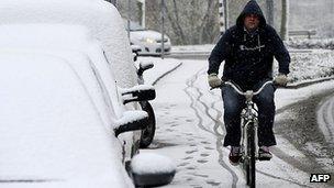 Cyclist in the snow in Den Bosch, Netherlands - file pic