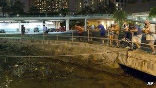 Watching water levels in Ala Wai Harbor, on Oahu island