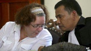 Lindsay Sandiford talks to her Indonesian lawyer Ersa Karo Karo in court during her trial in Denpasar, Bali, Indonesia