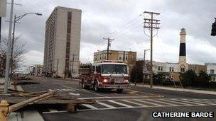 Boardwalk pieces scattered in a road in Atlantic City, Photo: Catherine Barde