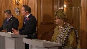 David Cameron, flanked by Liberian President Ellen Johnson Sirleaf and Indonesian president Susilo Bambang Yudhoyono.