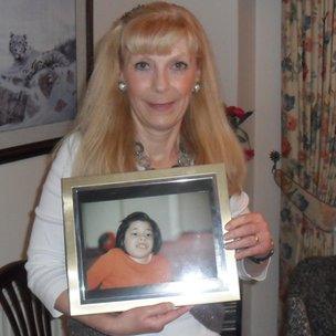 Christine Papalabropoulos holds a picture of her daughter Tina who died after poor care at Basildon Hospital.