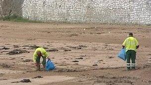 Beach cleaners on a beach in Thanet