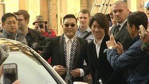 Psy arriving at the Oxford Union