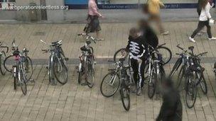 An Avon and Somerset Police officer steals a bicycle in an organised stunt