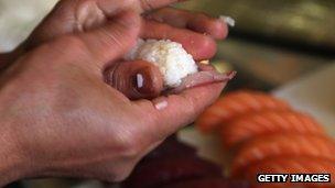 chef making sushi dish