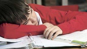 Boy asleep on desk